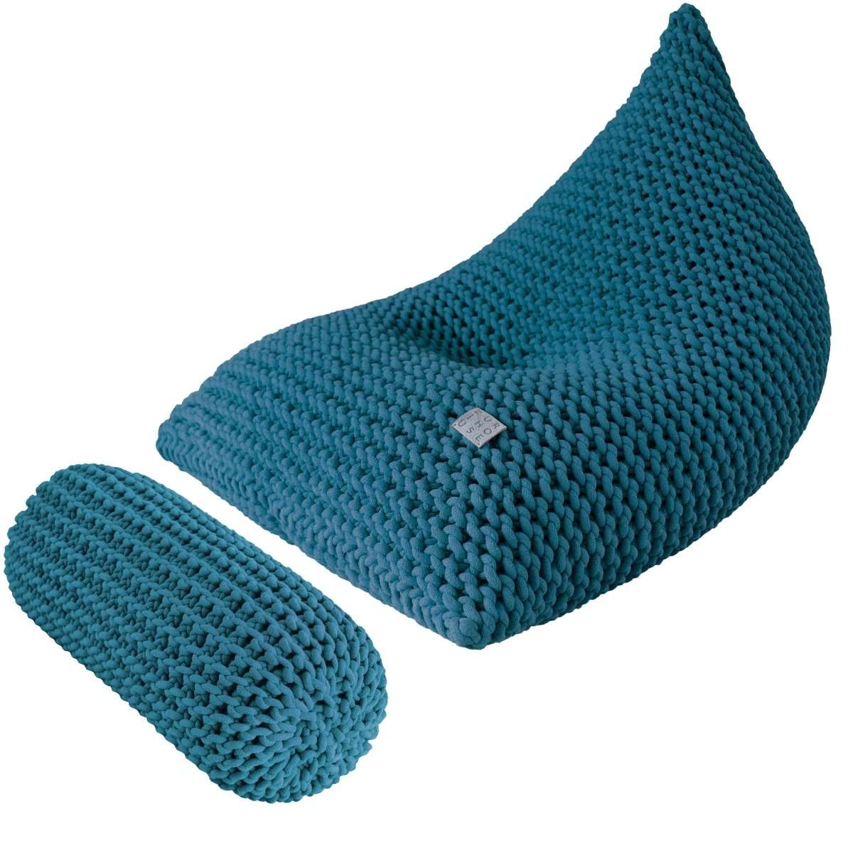 Chunky knitted bolster footrest | PETROL - Zuri House