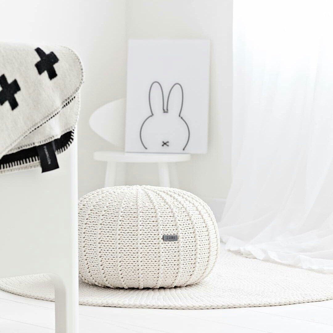 Ivory pouffe for kids’ room or modern interior