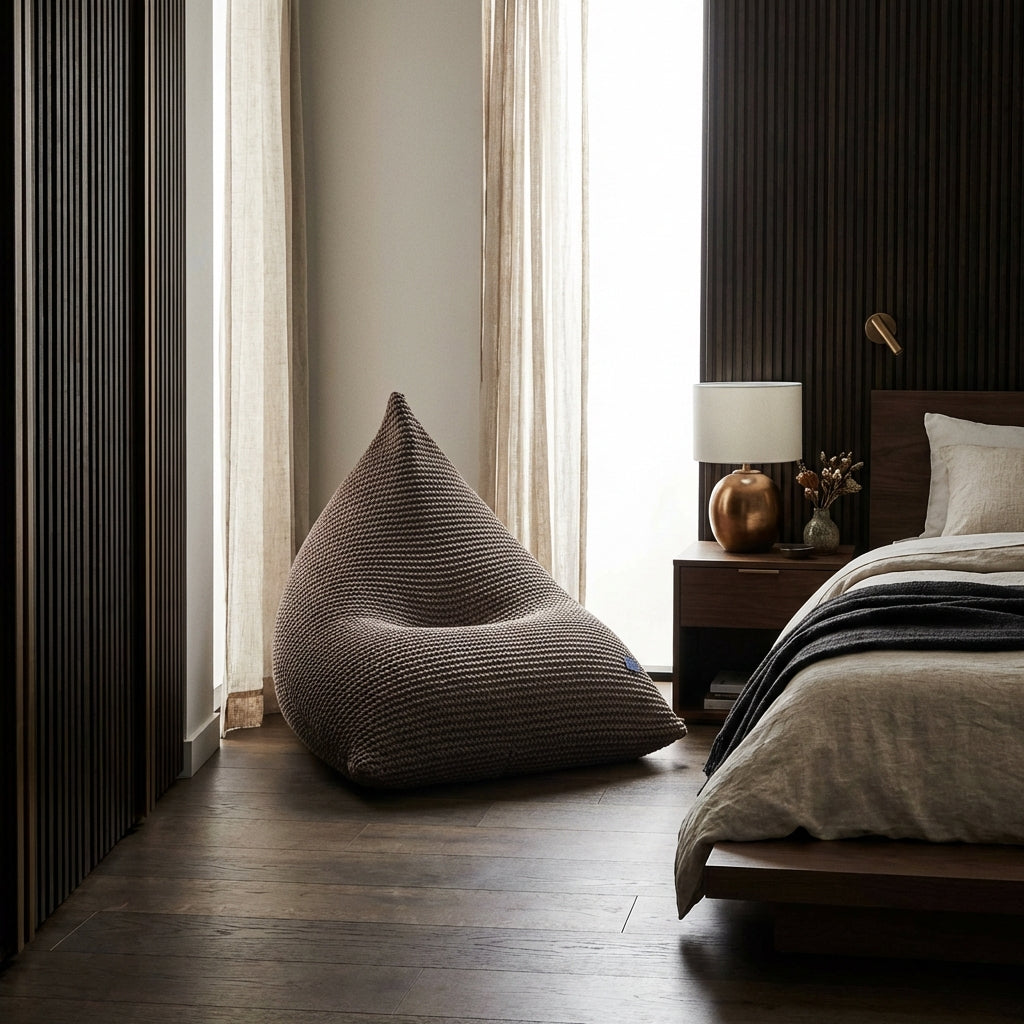 Knitted brown bean bag in the japandi style bedroom