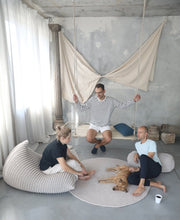 Chunky knitted bolster footrest | CINNAMON - Zuri House