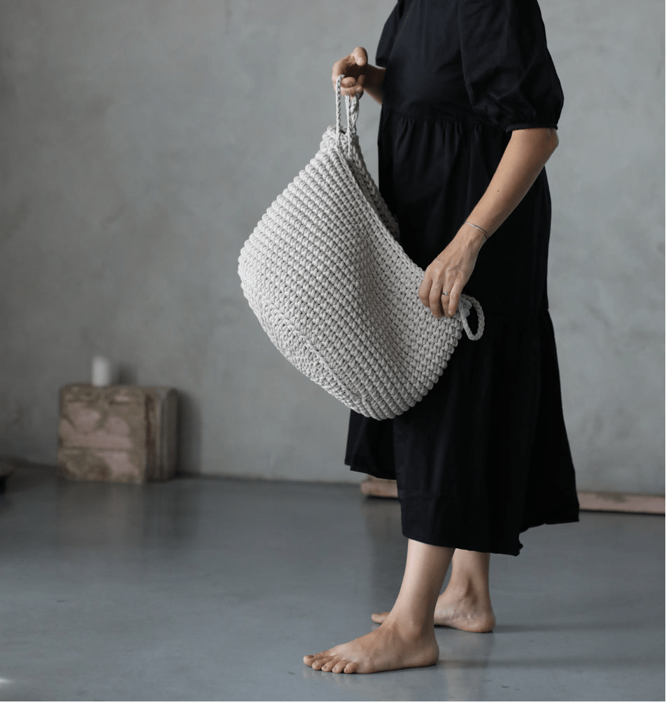 Minimalist cotton rope basket in oatmeal shade, versatile for organising magazines, blankets or laundry