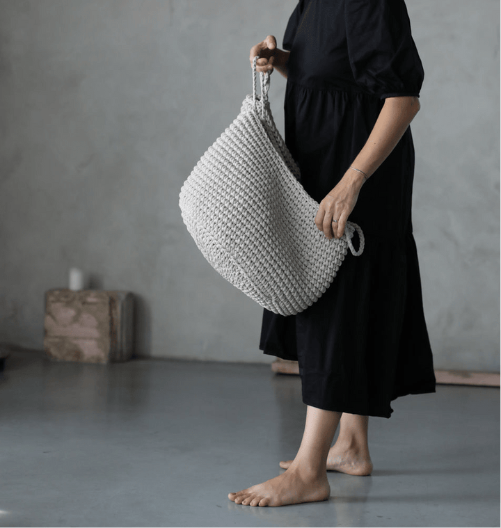 Minimalist cotton rope basket in oatmeal shade, versatile for organising magazines, blankets or laundry
