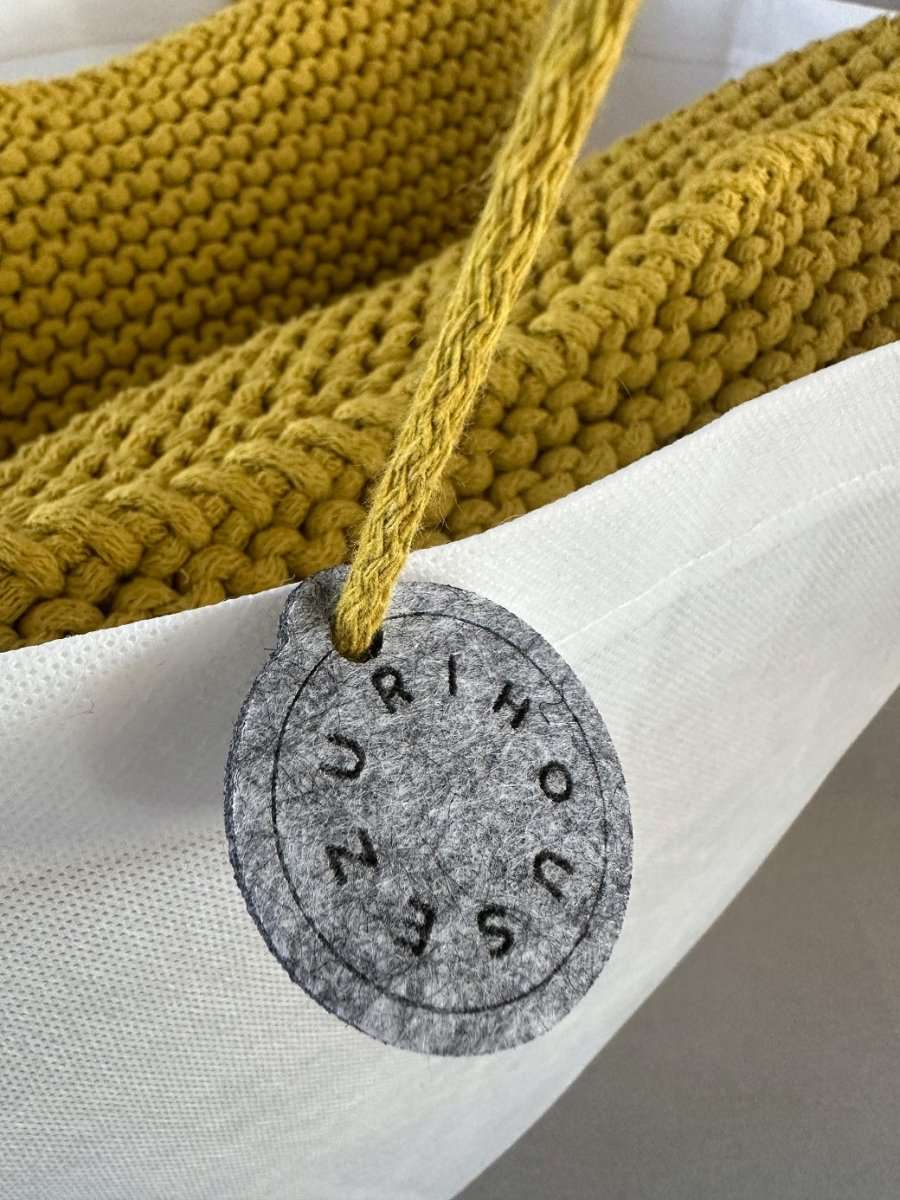 Knitted square cushion | GOLDEN KIWI - Zuri House