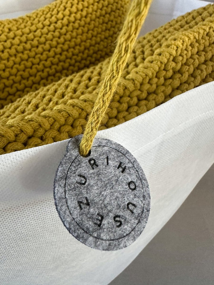 Knitted square cushion | GOLDEN KIWI - Zuri House