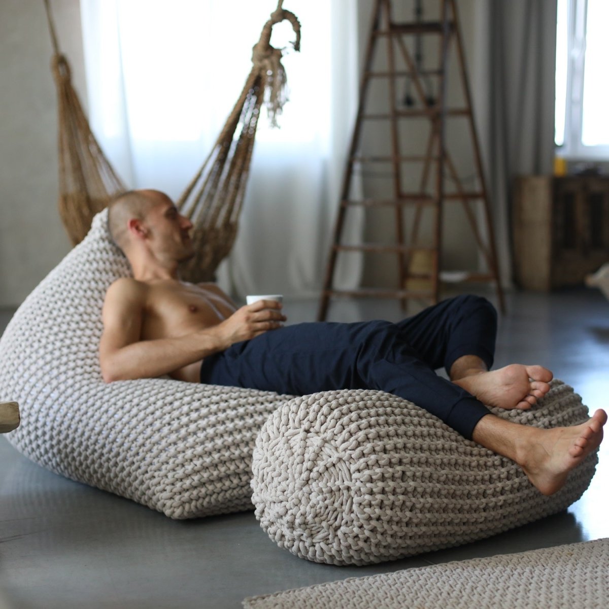 Chunky knitted bolster footrest | OATMEAL - Zuri House