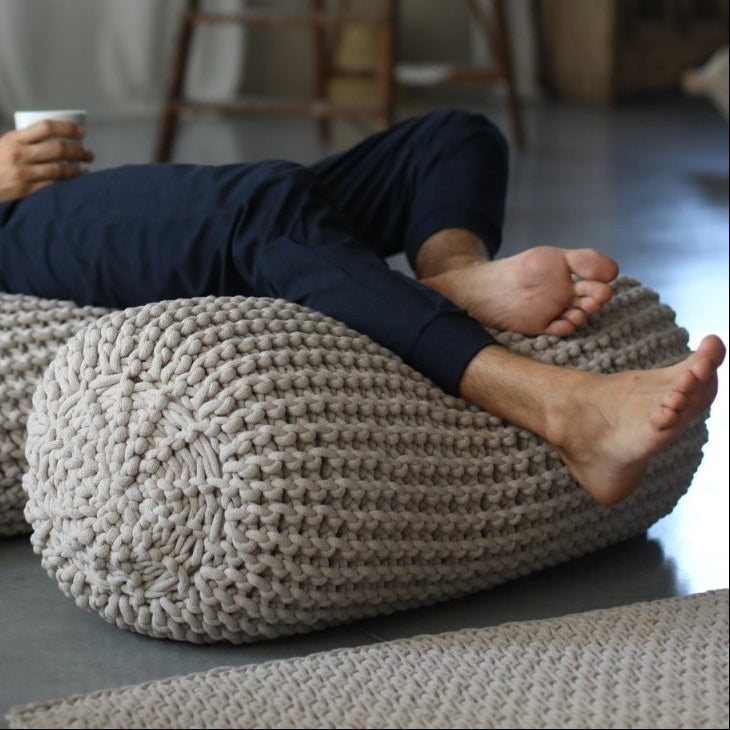 Chunky knitted bolster footrest | OATMEAL - Zuri House