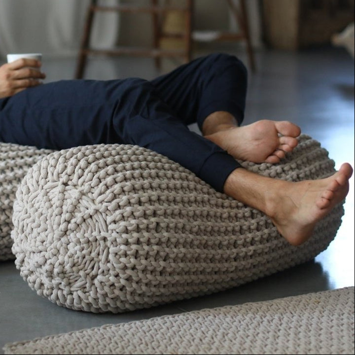 Chunky knitted bolster footrest | OATMEAL - Zuri House