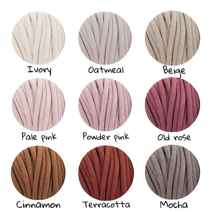 Chunky knitted bolster footrest | OLD ROSE - Zuri House
