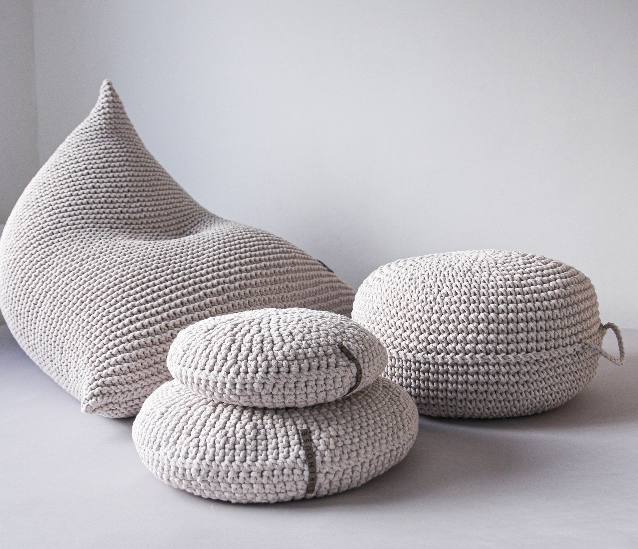 Textured oatmeal cotton bean bag highlighting its handcrafted stitch pattern