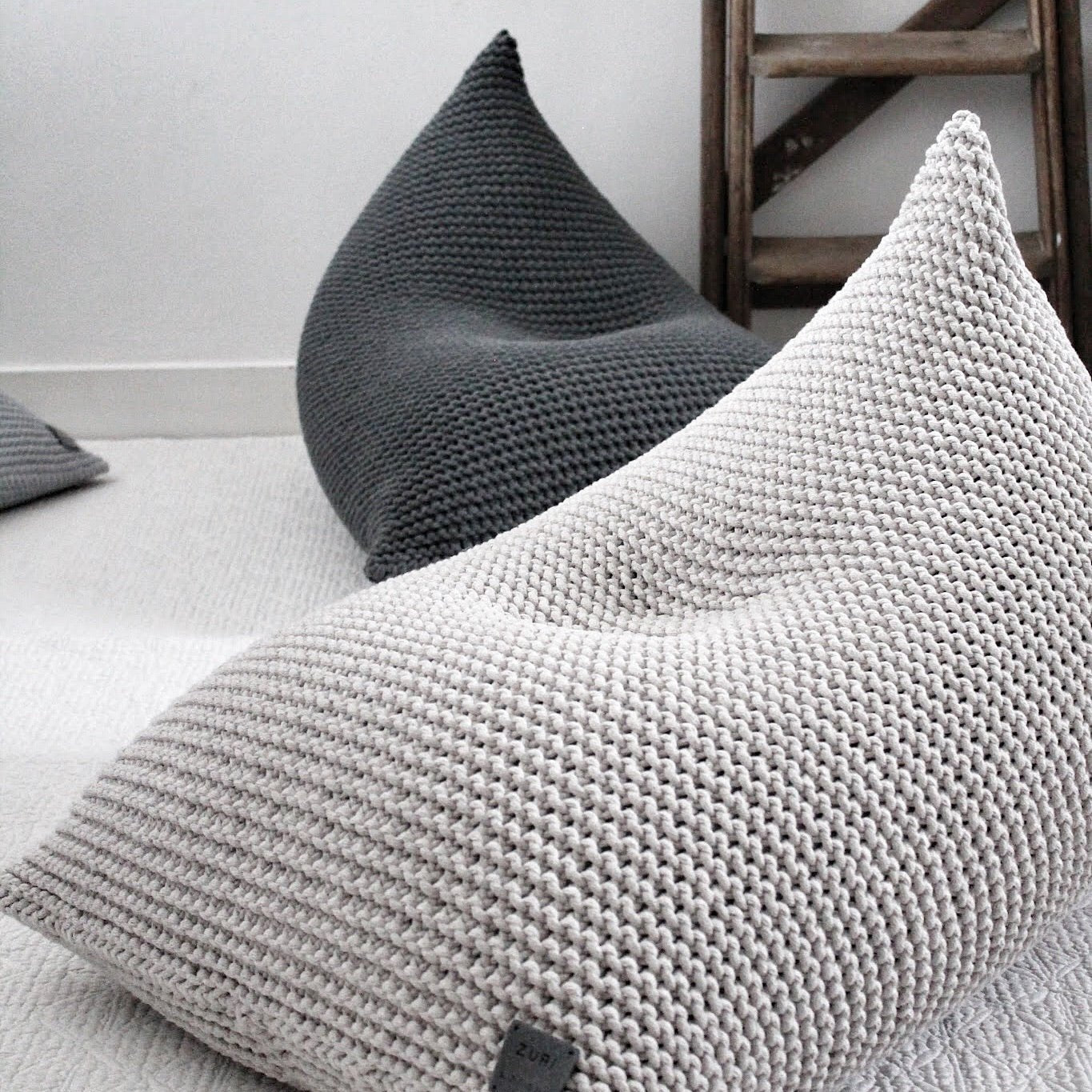 Textured oatmeal cotton bean bag highlighting its handcrafted stitch pattern