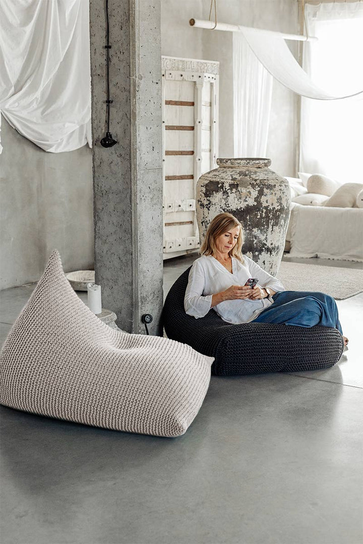 Textured floor seating in oatmeal cotton yarn for serene, Scandinavian interiors