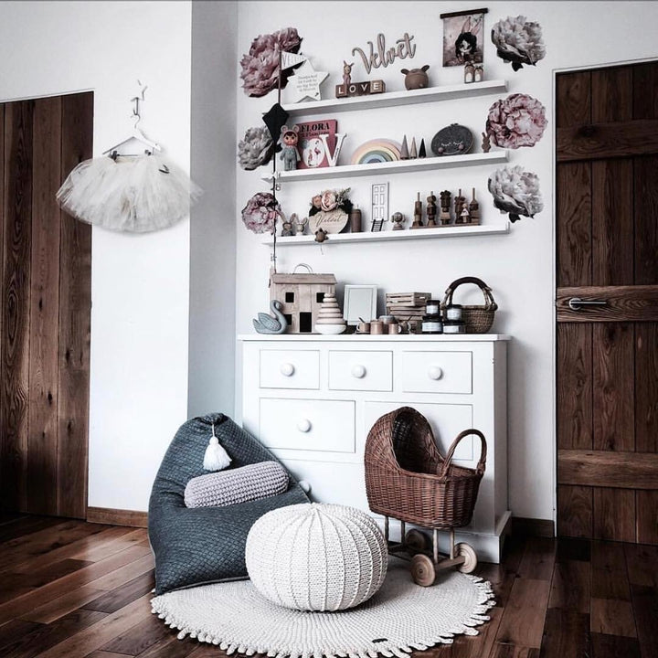 Handmade cotton pouffe styled in child-friendly space