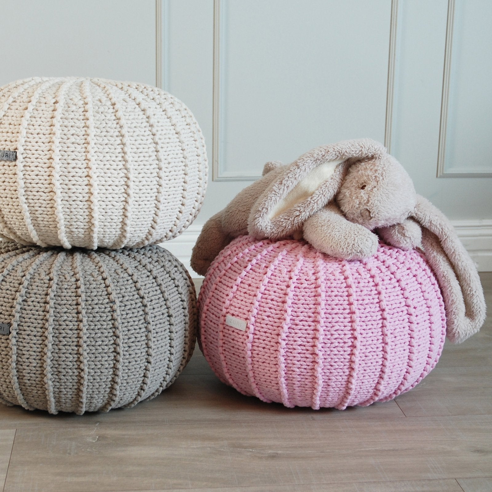 three knitted pouffe in white, pink and beige - kids space