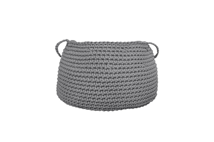Durable grey crochet basket used for toy storage in a modern kids’ room