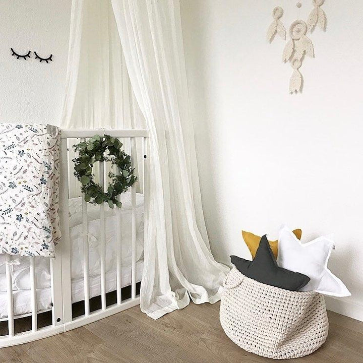 white crochet storage basket